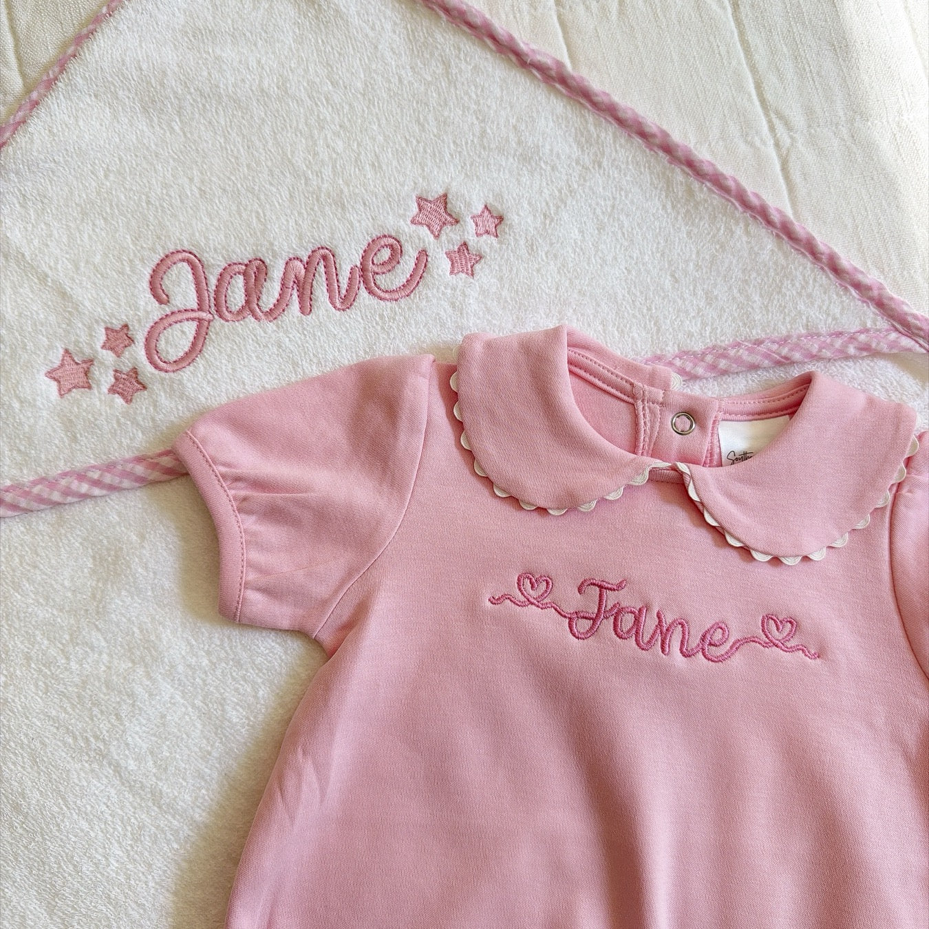 Pink Jane embroidered towel and outfit